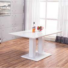 Milano is an extendable dining table with a white tempered glass that sits on a white high gloss painting metal. Samirah Dining Table Modern Glass Dining Table Dining Table Dining Table Setting
