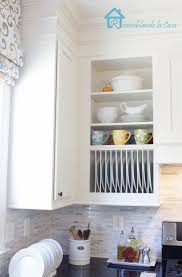 Or, pull the entire shelf away from the wall to reveal two additional hidden storage areas. Diy Inside Cabinet Plate Rack Remodelando La Casa