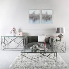 A sleek addition to any seating group or entertainment space, this understated coffee table lends a stylish touch to your environment. Azaria Stainless Steel Metal Coffee Table Silver Coffee Tables
