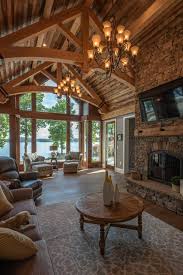 The beams went from a reddish tone that we tried to love, but just couldn't (to us they just looked like they stuck out like a sore thumb)… we definitely still have to deal with the ceiling and those fans among a few other things, so this is just the beginning of the top 5% of the room's transformation. Great Room Ideas Timber Frame Great Room