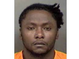 Man arrested after body found inside car in east Charlotte