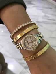 Jewelry Stacking Ideas How To Use Match Wear Stack Cartier Love Bracelets Howtomatch Org In 2020 Stacked Jewelry Love Bracelets Womens Watches Luxury