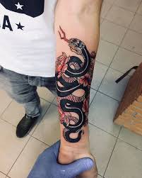 Either you love them or you absolutely loathe them. Meaning Of Snake Or Serpent Tattoo Blendup Tattoos