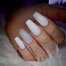 Sparkly nail designs will suit any formal or informal event. These Beautiful Classy White And Sparkly Nails Are You Looking For Short Coffin Acrylic Nail Design That Are Exc Sparkly Nails White Coffin Nails Trendy Nails