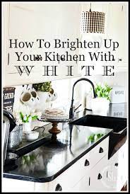 Wash your cupboards with a fizzy mixture of 1 cup vinegar, 2 cups warm water and 1 tablespoon baking soda. Brighten Up Your Kitchen With White Stonegable