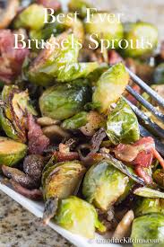 Delicious Tasting Best Ever Brussels Sprouts Are Oven Roasted To Perfection With Bacon And Mushrooms A Fav Appetizer Recipes Brussel Sprouts Cooked Vegetables