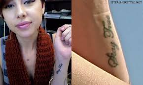 Lil Debbie's Button & "Stay True" Wrist Tattoos