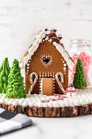 Once the powdered sugar is incorporated, turn mixer to high and continue beating until thick and the icing. How To Make A Gingerbread House House Of Nash Eats