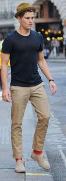 Basic Black Tee Khakis Colorful Socks And Fedora For The Win Basics Can Be Vibrant The Tee Project Mens Fashion Mens Outfits Well Dressed Men Mens Fashion