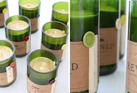 We've seen pretty wonderful art made from recycled wine corks but this is a pretty unique use for wine bottles. Rewined Candles Made From Repurposed Wine Bottles By Stitch Design Co A Charleston Based Design Recycled Wine Bottles Diy Soy Candles Wine Bottle Candles