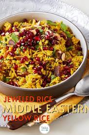 Cook rice in rice maker or pot and after rice is cooked, stir ingredients together one more time. Jeweled Rice Spiced Middle Eastern Yellow Rice Tara Teaspoon