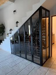 Fabrication D Une Verriere En Sous Escalier Pour Cave A Vin A Istres Ferronnerie D Art Pou Creations S Home Wine Cellars Escalier Design Home Interior Design