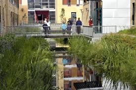 It has been sawmill and mill operation as far back as the 17th century. Bjolsen Campus Landscape Snohetta