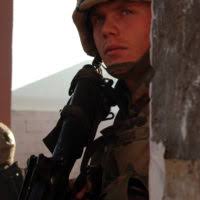 A Marine from 1ST MEF an eye out for insurgents during combat operation in  Fallujah