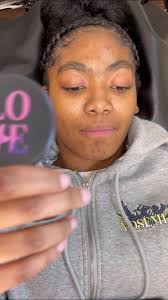 fighting off a smile because she LOVES her new brows Her natural b...