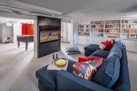 Floor cabinets provide storage for electronic equipment. Basement Remodels Are Hot Because Of The Pandemic Here S A Really Good One Washingtonian Dc