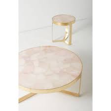 This sleek faux leather ottoman doubles as a large coffee table, as well as serving its primary function to prop up your feet. Prettiest Coffee Tables For Your Living Room Best To Buy Style Living