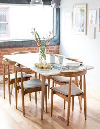 With a solid wood frame for lasting use, this dining table features an open base and a rectangular top that's perfect for hosting everything from dinner. Mid Century Modern Dining Table And Chairs Flax Twine