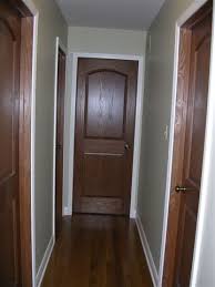 Painted Trim With Real Wood Doors I Was Wondering What It Would Look Like To Keep The Doors Wood Wood Doors White Trim Wood Doors Interior Stained Wood Trim
