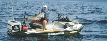 (51 l) cooler specially designed for fishing, with a recessed work surface, four innovative rod holders with configurable positioning, trolling slots, and tackle and bait storage. Sea Doo Fish Pro The Ultimate Mini Fishing Weapon Boat Gold Coast