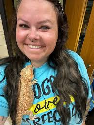 Why does bearded dragon run along glass after basking?