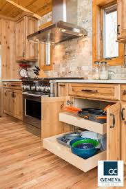 Geneva Cabinet Company Llc Lake Geneva Wi Pull Out Under Cabinet Storage For Pots And Pans An Hickory Kitchen Cabinets Lake House Kitchen Kitchen Furnishings
