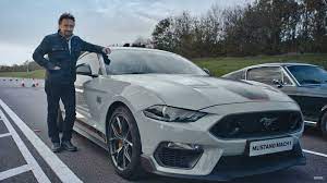 Mach 1 models featuring the available appearance package ($1,000) are the easiest to spot, with exclusive fighter jet gray paint, orange accents inside and out, orange brake calipers, and an ebony/orange interior to boot. See Richard Hammond Test Drive The New Ford Mustang Mach 1