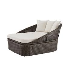 Have you ever considered owning an outdoor daybed? Hampton Bay 2 Person Brown Wicker Outdoor Patio Daybed With Almond Cushion The Home Depot Canada
