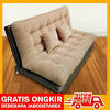 Sofa yang memiliki rangka kayu dengan kain pelapis warna cerah masih. 1