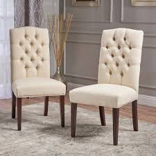 Ok, so one of my most asked questions is 'where are those tufted wing back chairs from in your living room?' Harriet Tufted Dining Chair