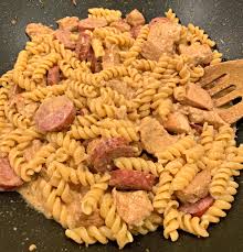 Add the pasta, stirring until evenly mixed. Creamy Cajun Chicken And Sausage Pasta The Cookin Chicks
