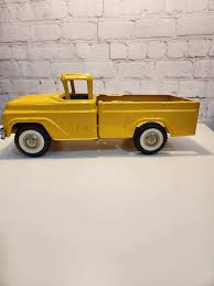 Image result for Yellow 1960 Petit Truck