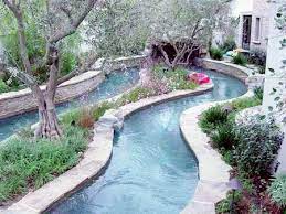 Imagine floating in a river in your own backyard! Lazy River In The Back Yard Are You Kidding Uhh Yes Backyard Dream Backyard Lazy River Pool