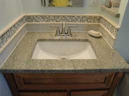 When tiling a backsplash or heat guard. Bathroom Tile Accent Ideas Used The Glass Tile Around The Sink Subway Pencil Glass Tile Pencil Backsplash Bathroom Sink Trendy Bathroom Sink