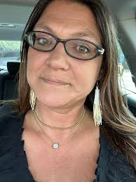 Matching pink cardigan and earrings for tonight's live