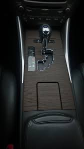 Maharaj says wraps change the color or appearance to what the customer wants, but are removable if the car needs to be sold or turned in after a lease. Car Interior With Wood Vinyl Wrap Check Out Other Products And Services Design 2 Shine Has To Luxury Car Interior Car Interior Accessories Car Interior Design
