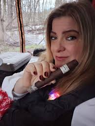 Cigar Enthusiasts Share Favorite Cigars in a Cigar Tent