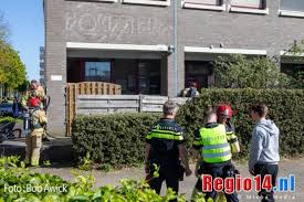 Vogel gered bij woningbrand in Huizen