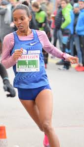 + over 4000 participants from more than 40 coutries run for 42,195 km to reach the kleine scheidegg at 2091 metres above sea level. Helen Bekele Tola Wikipedia