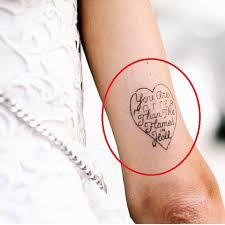 The side of rag's right hand has the word, rhythm tattooed on it and the side of his left one has the word, blues tattooed on it. Chiara Ferragni S 27 Tattoos Their Meanings Body Art Guru