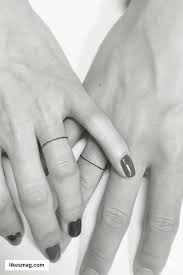 20 Best Matching Couple Tattoos To Express Your Love Wedding Tattoos Wedding Band Tattoo Tattoo Wedding Rings