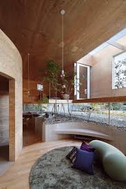 This Japanese Home Has A Sunken Interior That Blends Into The Earth Interior Architecture House Design Architecture Design