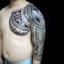 Chest and shoulder samoan tribal tattoo on man. 75 Half Sleeve Tribal Tattoos For Men Masculine Design Ideas