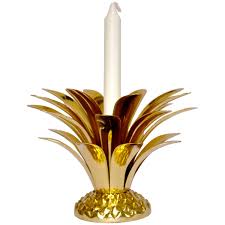 Pineapples are a symbol of welcoming guests into your home, and this candle holder does just that with its charming design. Pineapple Candle Holder 4 For Sale On 1stdibs