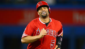 Albert pujols is a professional baseball player who emigrated from the dominican republic to the us. Albert Pujols Gives Jersey To Nico A Young Fan With Down Syndrome Sports Illustrated