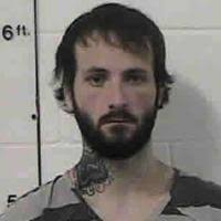 Three charged in woman's death