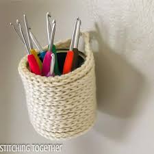 You could use an adhesive hook to hang it. Mini Crochet Hanging Baskets