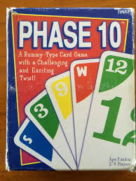 Play moves clockwise until someone completes a phase and goes out. the first player that goes out is the winner of that hand. Boardgame S Phase 10 And Rummikub