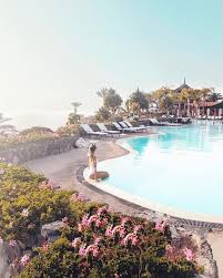 Leonie Hanne Ohhcouture On Instagram Caught A Sunset At This Flowerly Infinity Pool On My La Summer Vacation Destinations Tenerife Travel Around The World