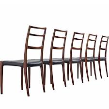 Gunni Omann Danish Dining Chairs In Black Leather And Mahogany Danish Dining Chairs Dining Chairs Chair